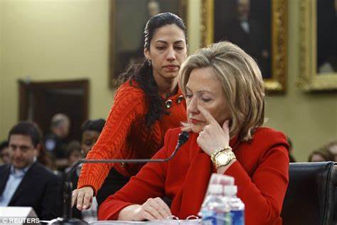 A person sitting next to another person Description automatically generated with low confidence