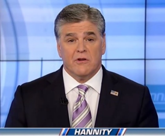 A person in a suit Description automatically generated with medium confidence