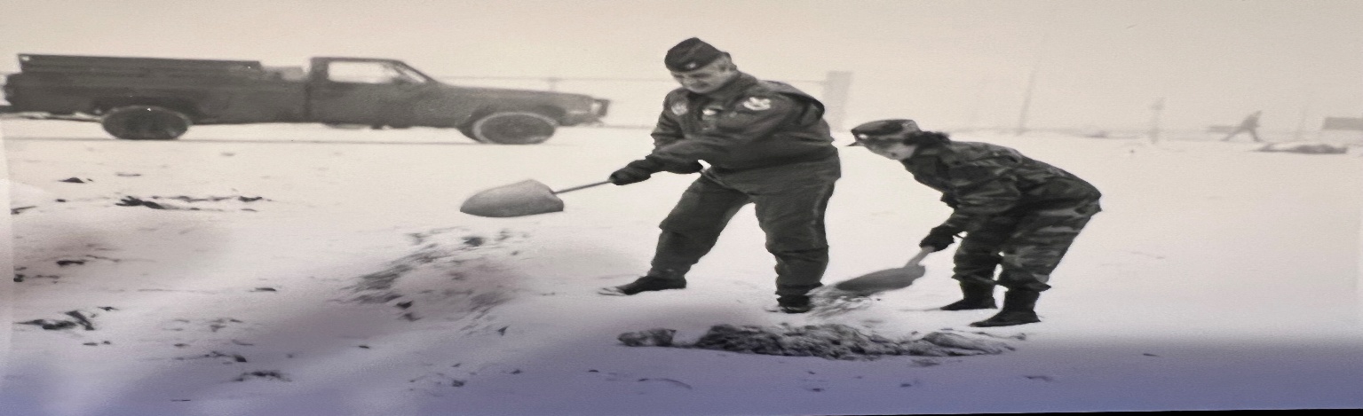 A couple of soldiers digging in the snow AI-generated content may be incorrect.