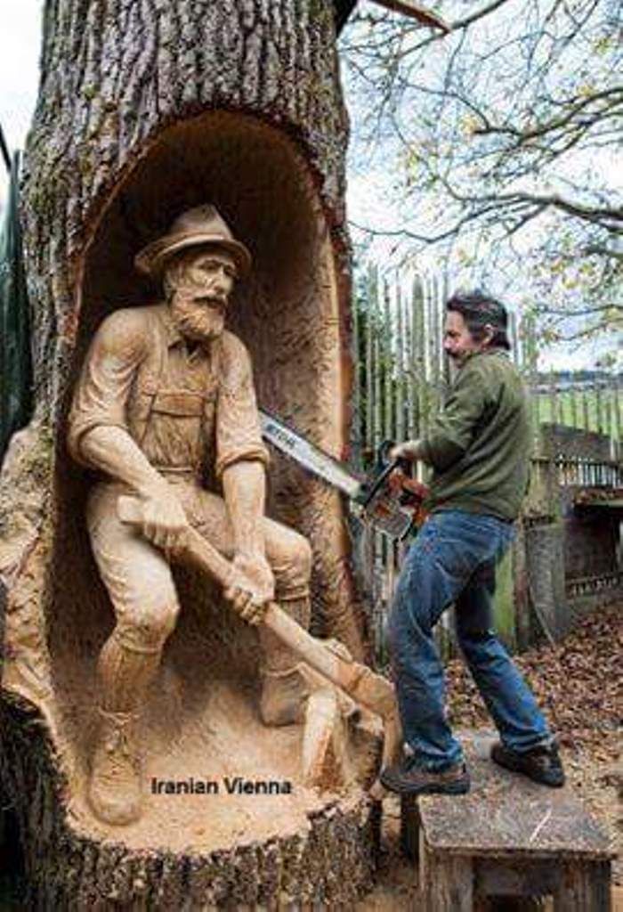 A person holding a chainsaw and carving a statue AI-generated content may be incorrect.