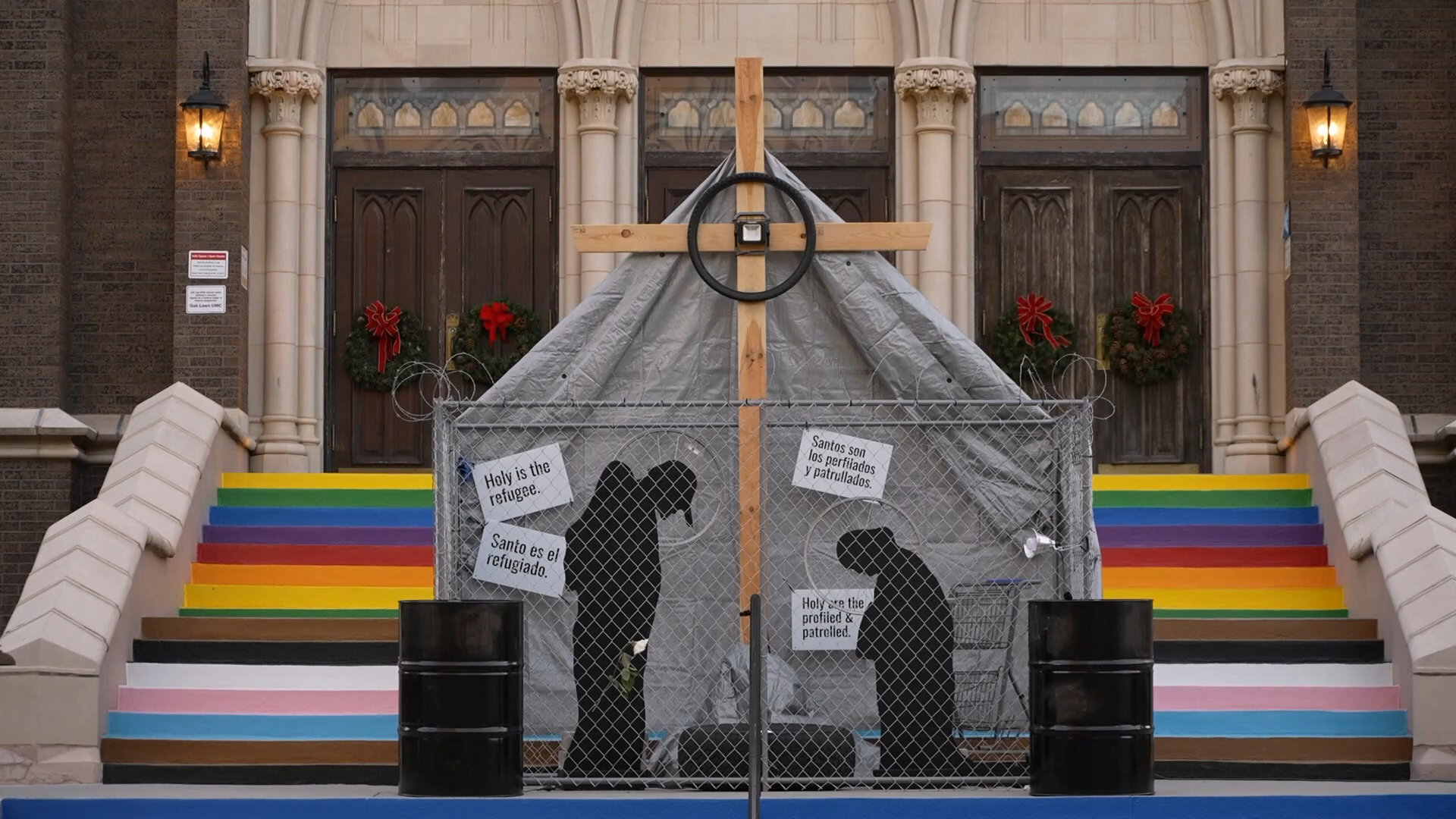 A group of people in black silhouettes in front of a building AI-generated content may be incorrect.